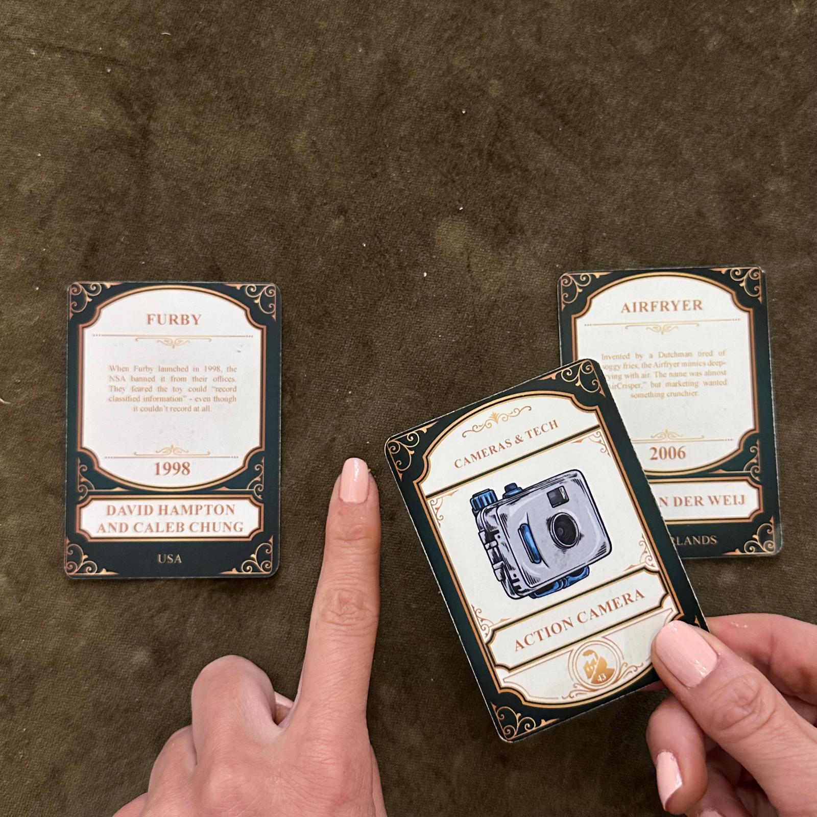 Hand picking a card from the spread, mid-placement