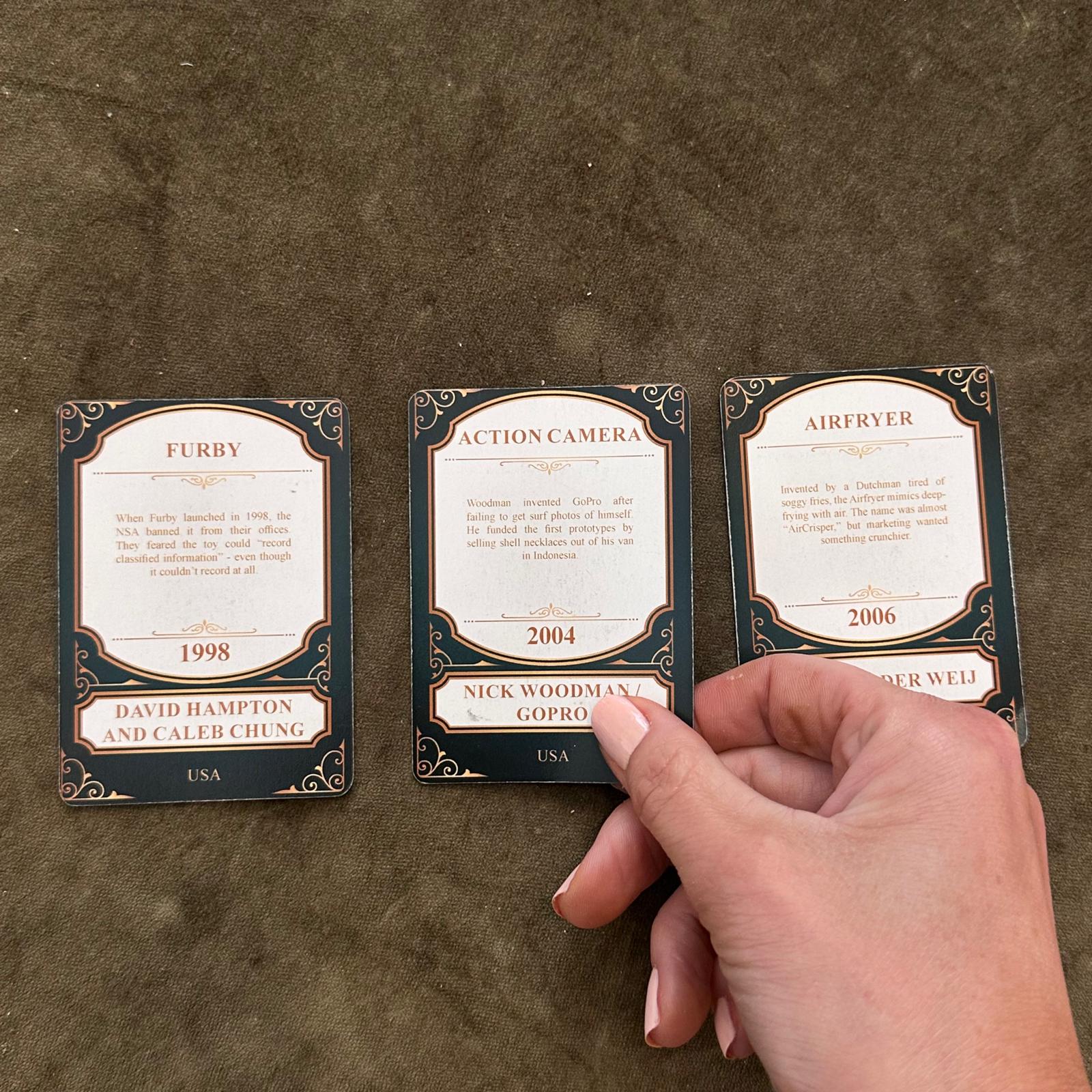 Three cards revealed showing years 1998, 2004, 2006